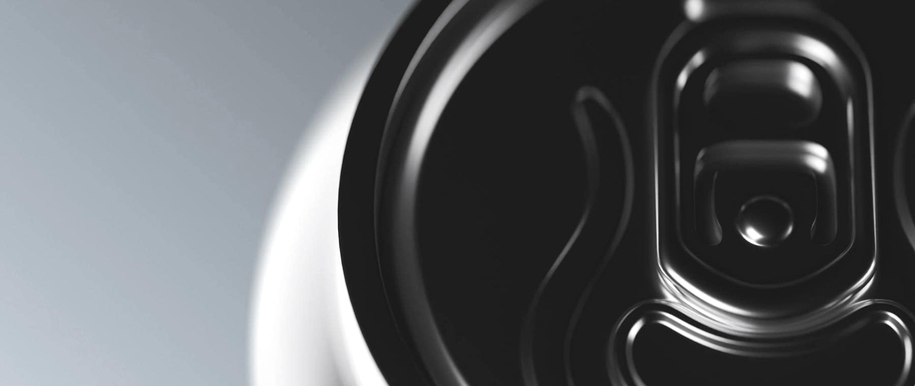 Close-up of a sealed aluminium can end and pull tab